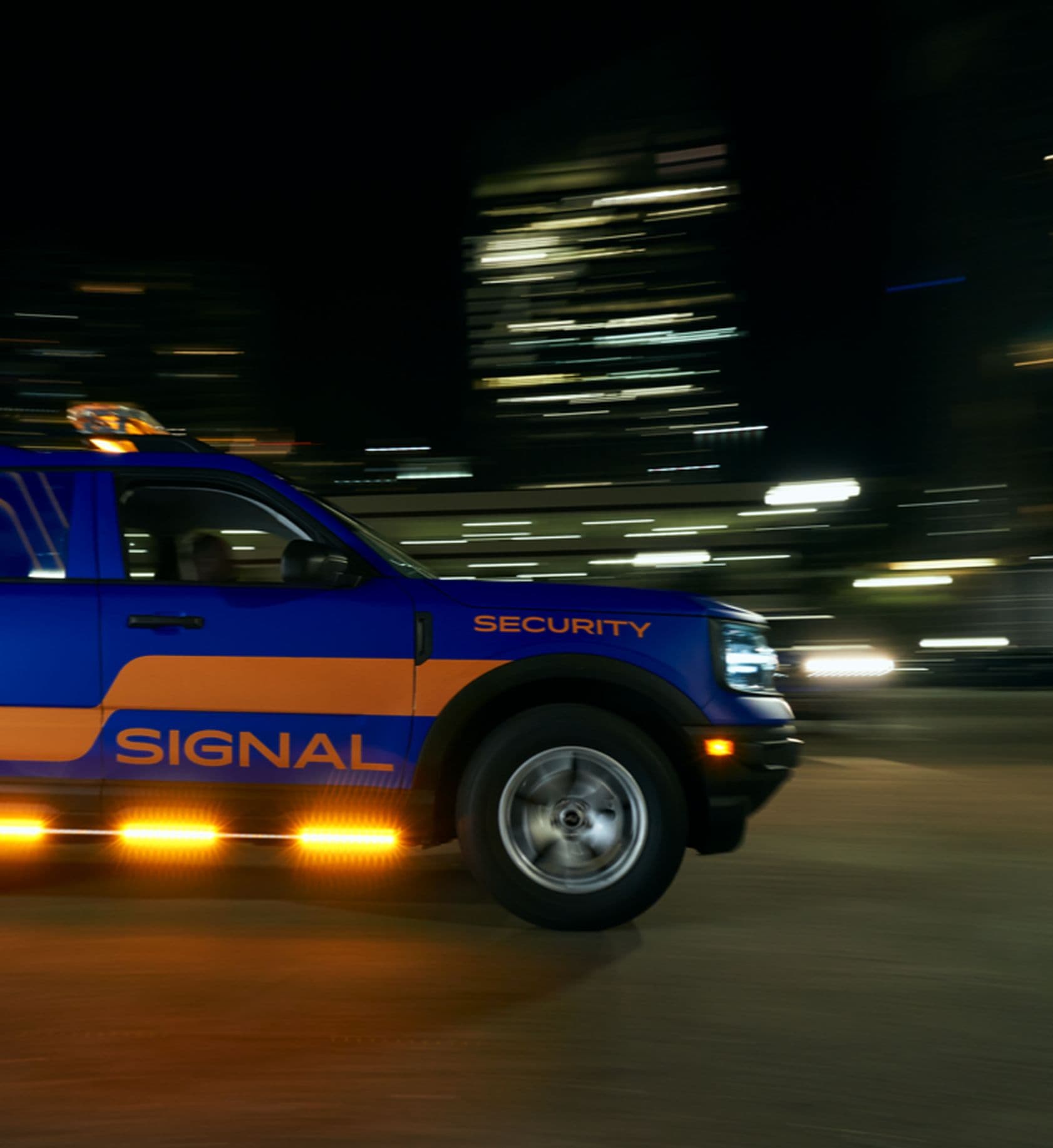 Signal patrol vehicle driving at night