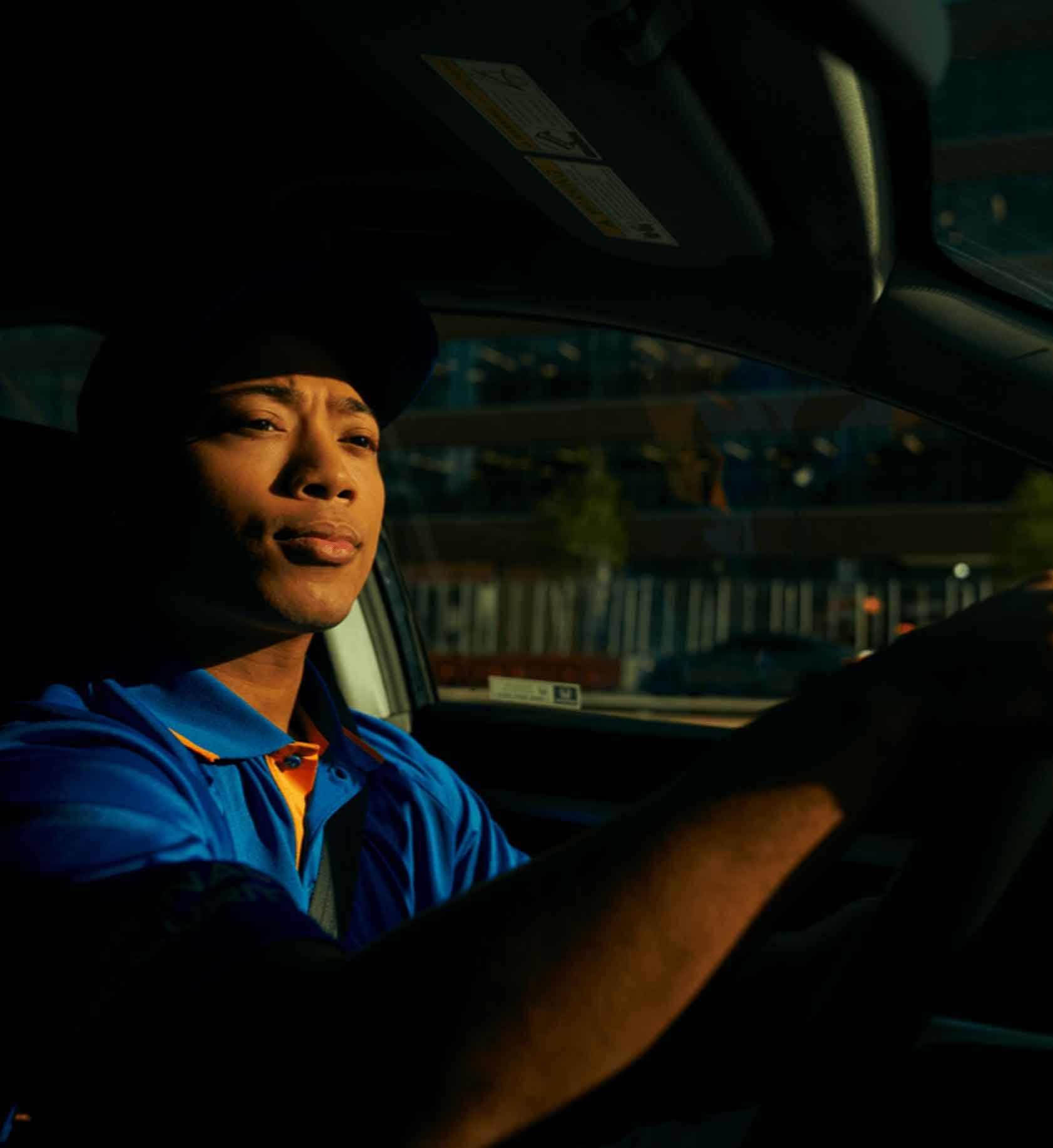 Signal employee driving a car at night